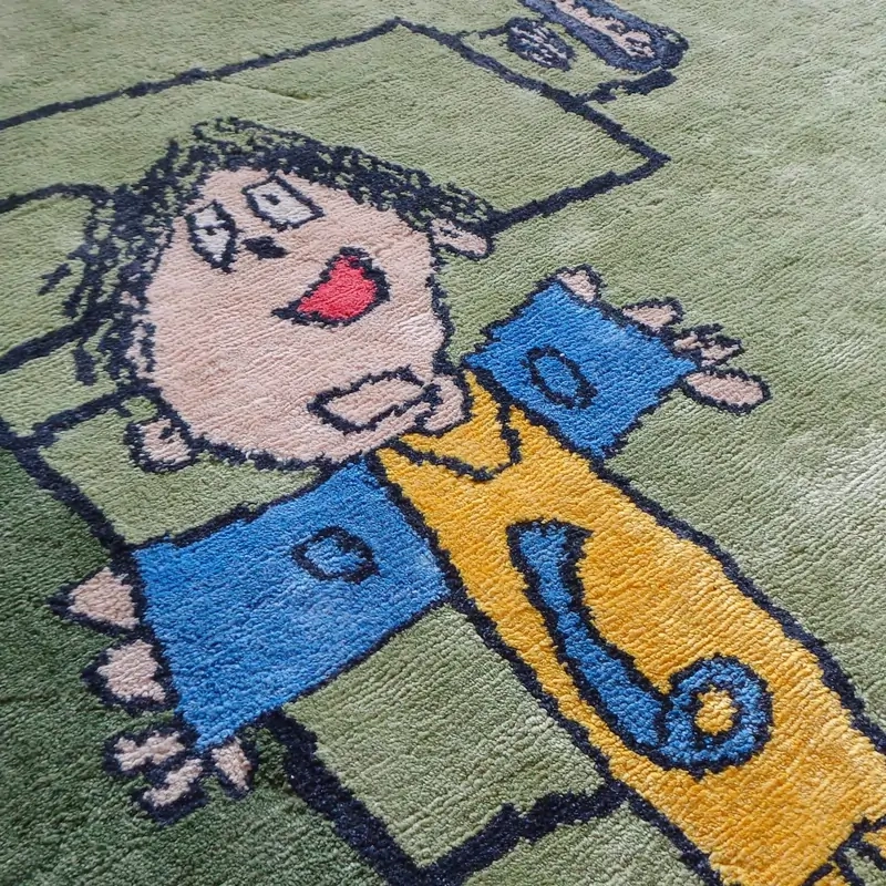 Handmade rug inspired by children's artwork with smiling kid playing soccer