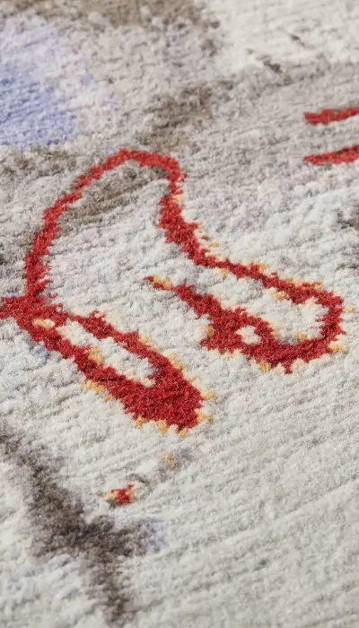 Closeup of handknotted rug based on father's Chinese watercolour and ink painting for his son's wedding gift