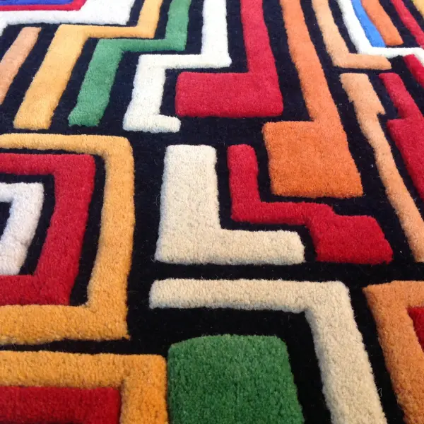 Embossed colourful design on black background
