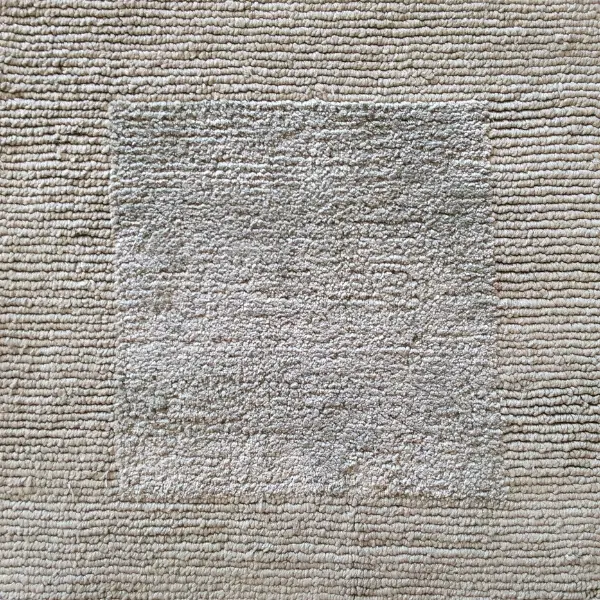Handknotted silk rug with loop pile frame and cut pile inner square