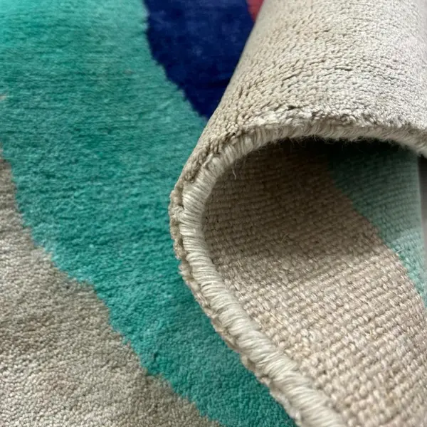 Linen closeup showing the front and the back of the rug