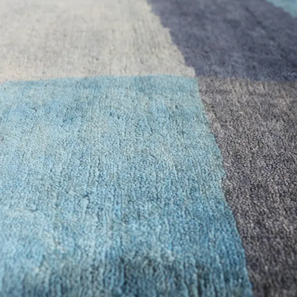 Mohair rug in greys and blues