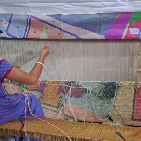 Process of weaving by hand one of our bespoke and custom rugs, by Rug Your Life