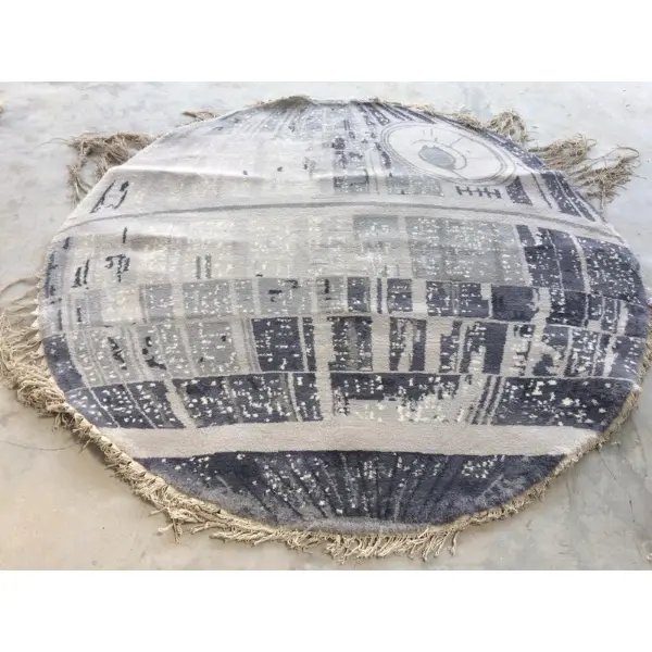 L'artisanat à l'origine du luxueux tapis sur mesure noué à la main inspiré de l'Étoile de la Mort de La Guerre des étoiles