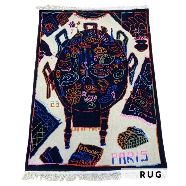 Handknotted rug with black dining table and colourful items in Paris