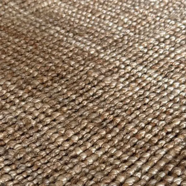 Primer plano de una alfombra de yute natural